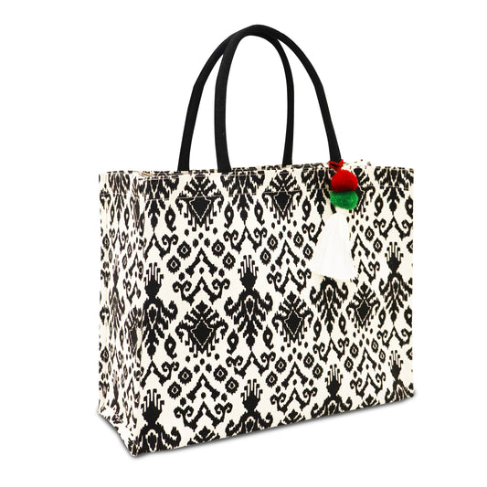 MAKE A STATEMENT WITH THE BOHO NOIR CARRYALL, WHERE BOHEMIAN CHARM MEETS MODERN FUNCTIONALITY