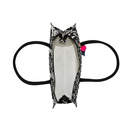 ORNATE NOIR SHOPPING BAG ELEGANCE IN EVERY DETAIL.